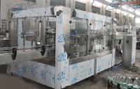 China 12 Heads Big Bottle Vacuum Filling Machine With Chain Feeding Conveyor factory