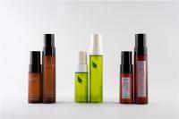 China Amber Green Plastic Lotion Custom Cosmetic Bottles Set / Foundation Pump Bottle factory