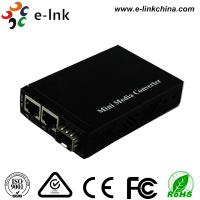 China Mini 2x  SFP Slot Gigabit Fiber Ethernet Media Converter 10/100/1000Base-T RJ45 to 1x 1000Base-X for sale