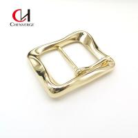 China 40mm Zinc Alloy Belt Buckle Gold Wavy Asymmetrical Bright Face Ladies for sale