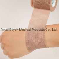 China Red Non Woven Cohesive Bandage Medical Compression Self-Adhering Flexible Protect Body Parts factory
