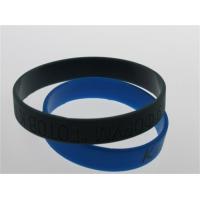 China solid color black custom debossed silicone bracelets factory