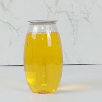 China Olive Shape Juice Plastic Storage Bottles 500ml Clear PET Container Jars factory