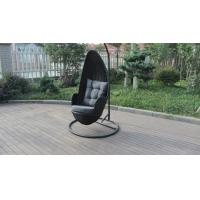 China Stock Discount Rattan Furniture Black Rattan Hanging Swing Chair With Grey Cushion for sale