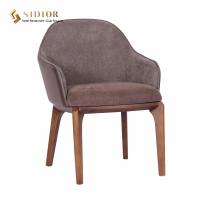 China Living Room Faux Leather Dining Chairs Upholstered Dining Arm Chair With Wood Legs for sale