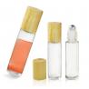 China Tansparent glass roll jars with bamboo caps, clear glass roll bottle factory