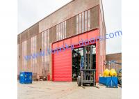 China Frequency controlled Vertical Lifting Fabric Industrial Doors For Large Openings factory