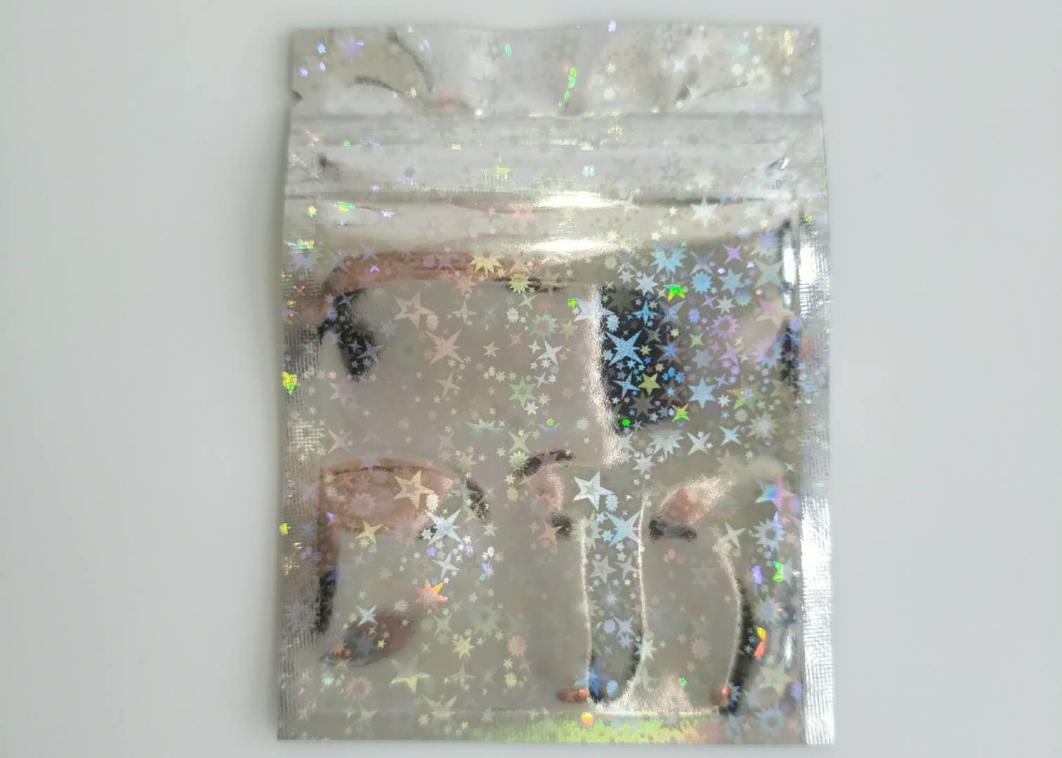 China Childproof Three Side Seal Pouch Holographic Laser Mylar Foil Lined With Zipper factory
