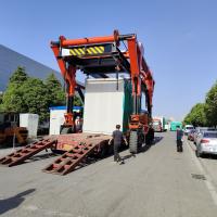 Quality 60T Electric Straddle Carrier Price Red Container Lifter Truck For Material for sale