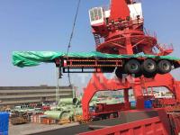 China Customized tri axle 80 ton heavy low bed semi trailer for Algeria factory