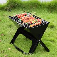 China Outdoor Portable Grill Charcoal Grills X Folding Grill BBQ for Camping Easily Cleaned factory