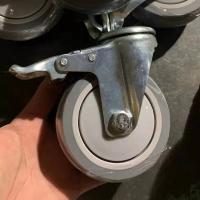 China 4 Inch Grey TPR Shopping Trolley Wheels With Locks Soft Bolt Hole Swivel Casters With Covers factory
