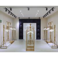 China Women Clothing Store Shelves / Retail Clothing Display Systems Golden Color factory